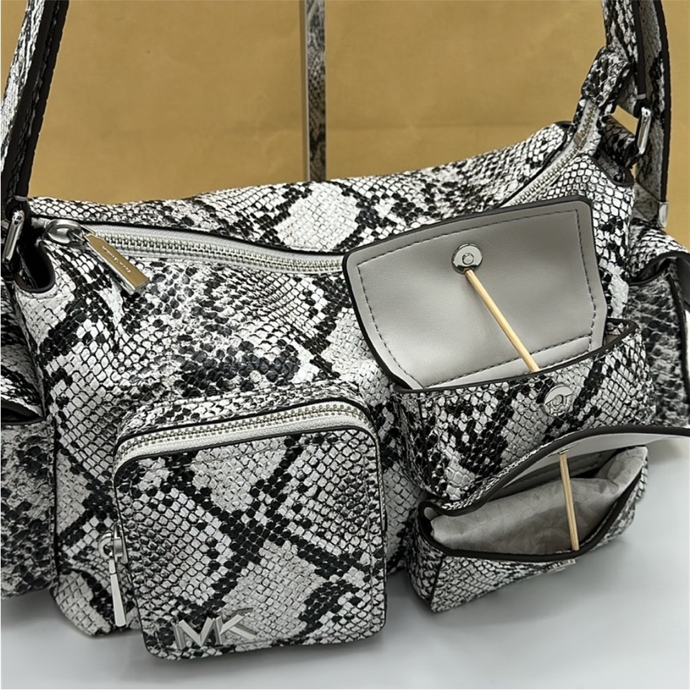 MICHAEL KORS Dakota Medium Snake Embossed Leather Pocket Shoulder Bag
ALUMINUM - Picture 9 of 15